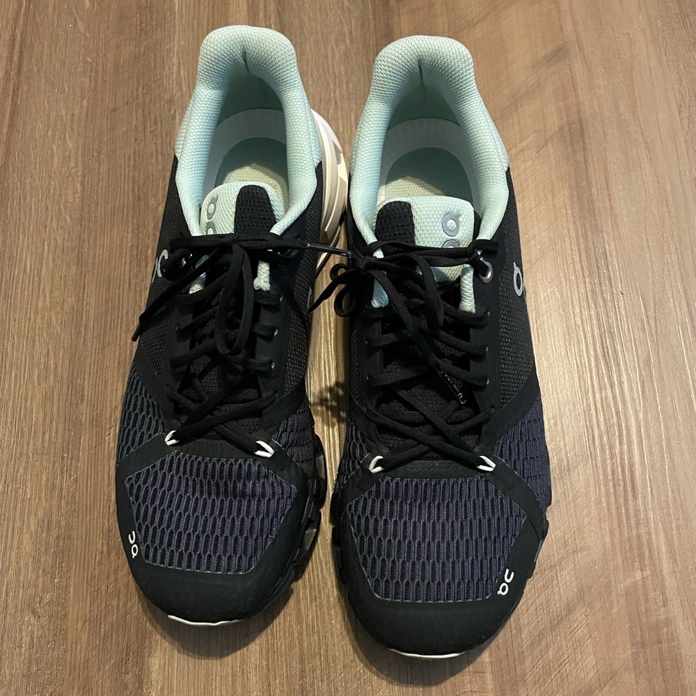 Like New - ON RunningWomen’s Black and Lime Green tennis shoes. Great condition!